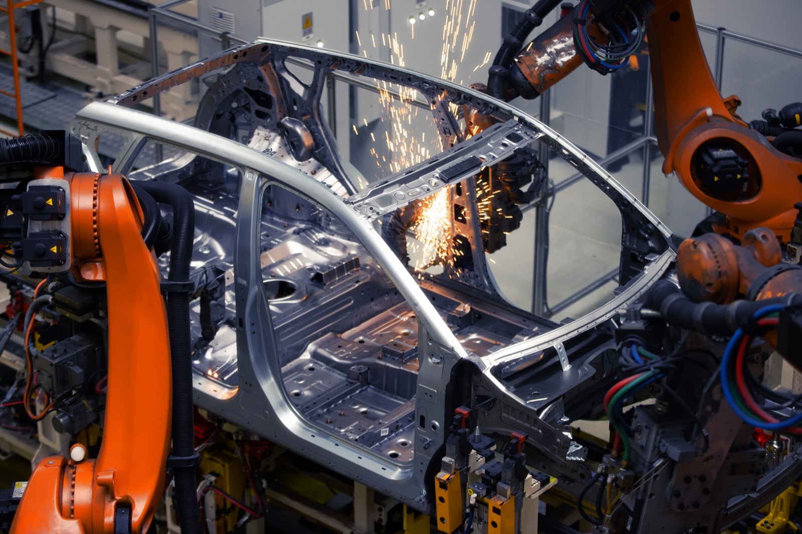 Robotic welding cell in an automotive body shop